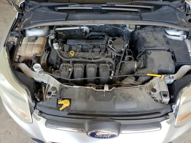 Foto 11 de la subasta – 2014 FORD FOCUS SE con VIN 1FADP3K27EL337452