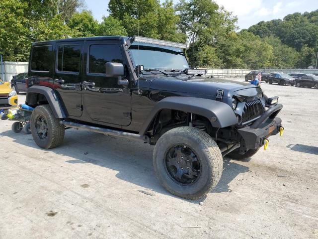 Photo 4 from auction – 2011 JEEP WRANGLER U with VIN 1J4BA3H10BL562240