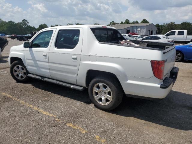 Photo 2 from auction – 2010 HONDA RIDGELINE with VIN 5FPYK1F44AB010893