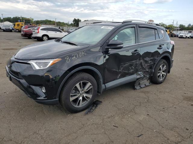 TOYOTA RAV4 ADVEN 2018 with VIN 2T3RFREV2JW852104 - Photo from auction