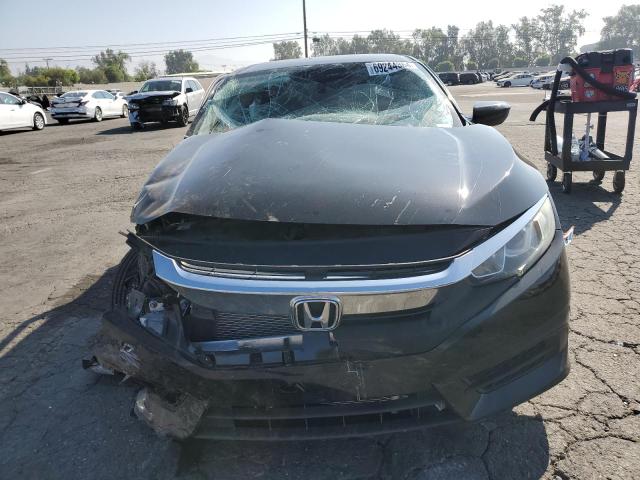 Photo 5 from auction – 2018 HONDA CIVIC LX with VIN 2HGFC2F59JH557391