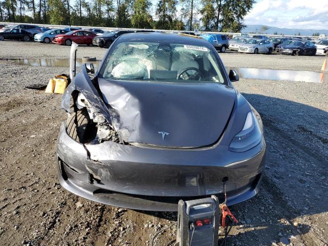 Photo 5 from auction – 2022 TESLA MODEL 3 with VIN 5YJ3E1EB8NF359474