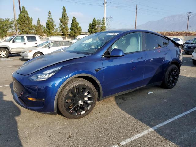 TESLA MODEL Y 2021 with VIN 5YJYGAEE8MF229123 - Photo from auction