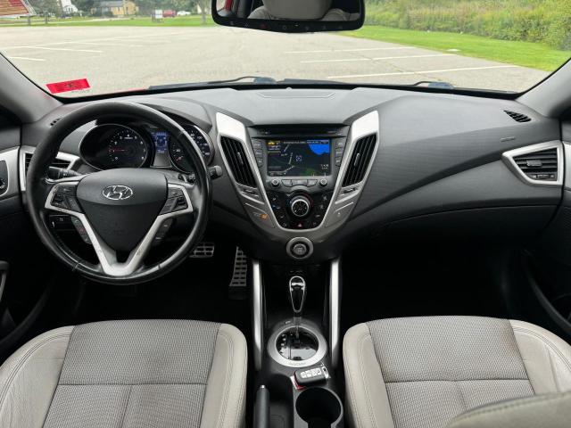 Photo 9 from auction – 2014 HYUNDAI VELOSTER with VIN KMHTC6AD8EU196127