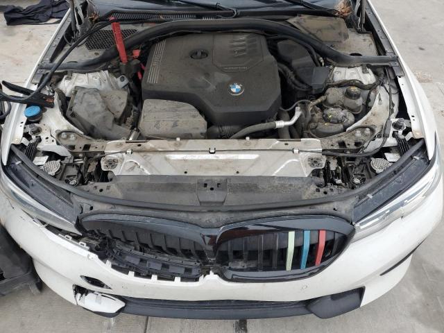 Photo 11 from auction – 2021 BMW 330I with VIN 3MW5R1J04M8B72492