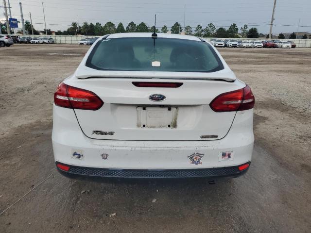 Photo 6 from auction – 2015 FORD FOCUS S with VIN 1FADP3E27FL255296