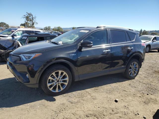 TOYOTA RAV4 HV LI 2018 with VIN JTMDJREV2JD162956 - Photo from auction