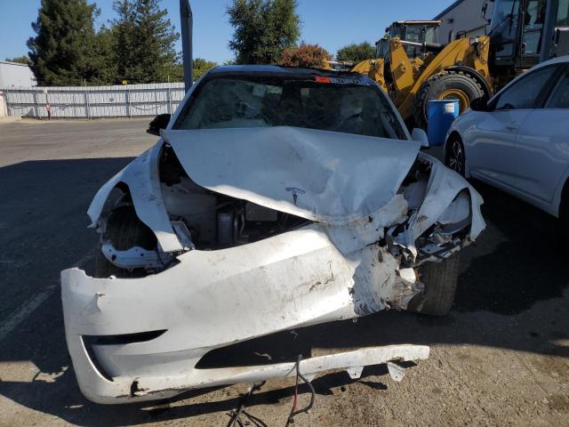 Photo 5 from auction – 2023 TESLA MODEL 3 with VIN 5YJ3E1EB2PF456091