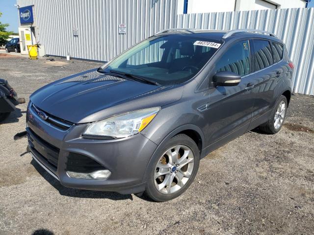 FORD ESCAPE TIT 2014 with VIN 1FMCU0JX8EUB69983 - Photo from auction