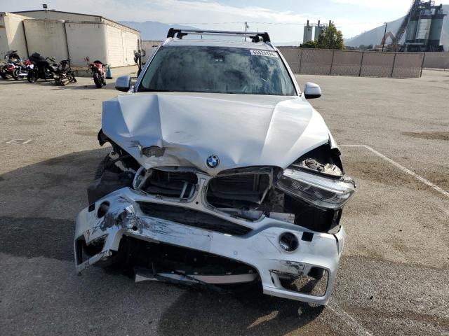 Photo 5 from auction – 2014 BMW X5 XDRIVE3 with VIN 5UXKS4C5XE0J94866
