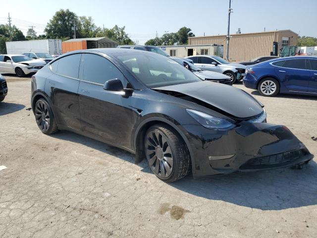 Снимка 4 от търг – 2023 TESLA MODEL Y с VIN 7SAYGDEF9PF855152