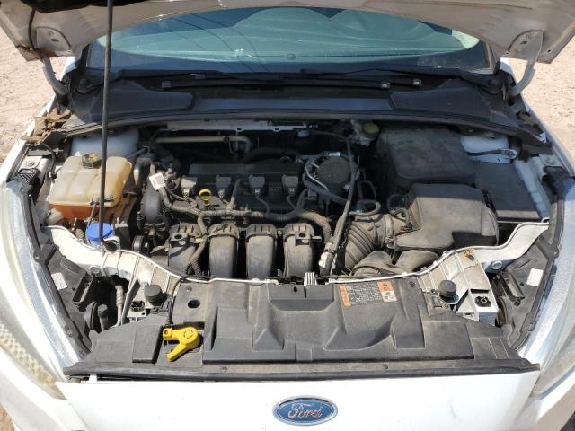 Photo 11 from auction – 2015 FORD FOCUS S with VIN 1FADP3E24FL321528