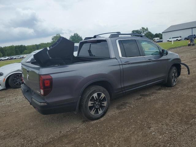 Photo 3 from auction – 2020 HONDA RIDGELINE with VIN 5FPYK3F54LB022856