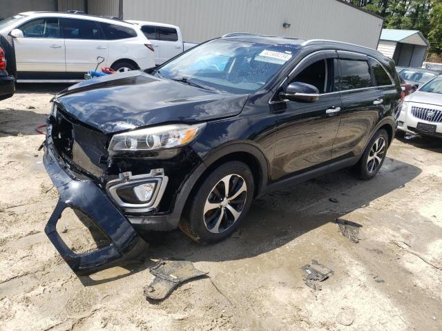 KIA SORENTO EX 2016 with VIN 5XYPH4A55GG113231 - Photo from auction
