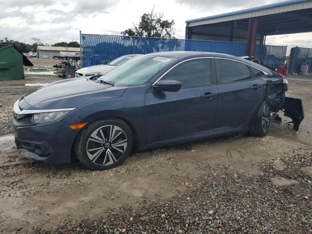 HONDA CIVIC EXL 2017 with VIN 19XFC1F79HE005793 - Photo from auction