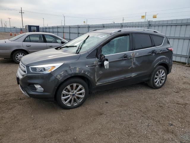 FORD ESCAPE TIT 2018 with VIN 1FMCU0J9XJUB14107 - Photo from auction