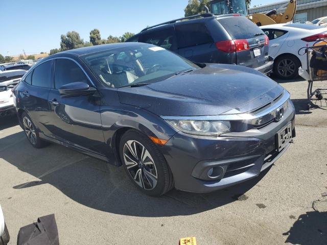 Photo 4 from auction – 2016 HONDA CIVIC EXL with VIN 19XFC1F7XGE208352
