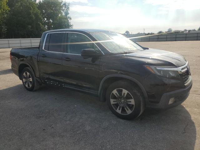 Photo 4 from auction – 2017 HONDA RIDGELINE with VIN 5FPYK2F64HB009826
