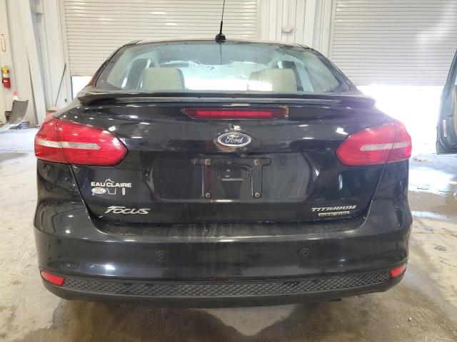 Photo 6 from auction – 2015 FORD FOCUS TITA with VIN 1FADP3J21FL248656