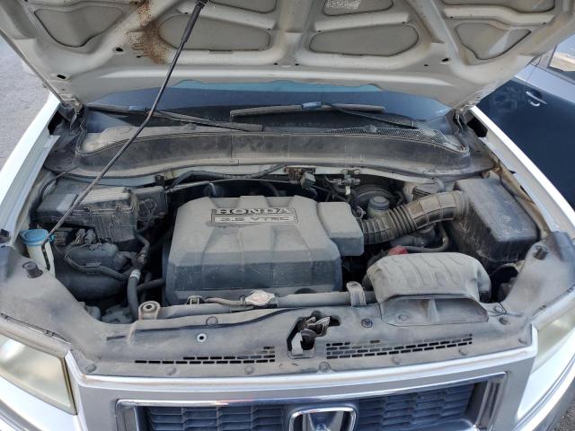 Photo 11 from auction – 2006 HONDA RIDGELINE with VIN 2HJYK16556H516893