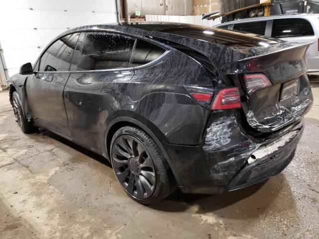Photo 2 from auction – 2022 TESLA MODEL Y with VIN 7SAYGDEF0NF323138