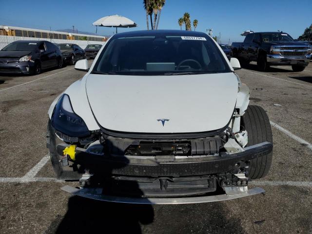 Photo 5 from auction – 2022 TESLA MODEL 3 with VIN 5YJ3E1EB2NF324204