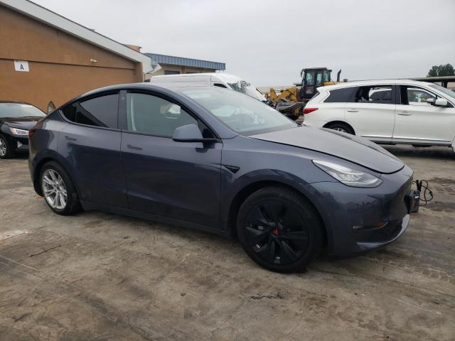 Photo 4 from auction – 2022 TESLA MODEL Y with VIN 7SAYGAEE8NF570025
