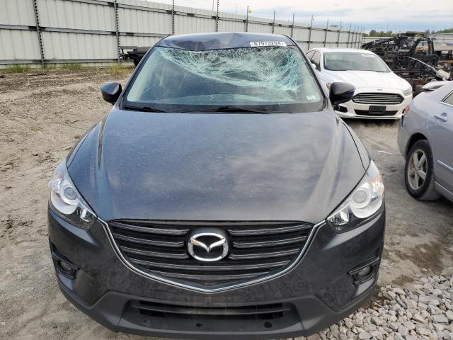 Photo 5 from auction – 2016 MAZDA CX-5 TOURI with VIN JM3KE4CY1G0896247