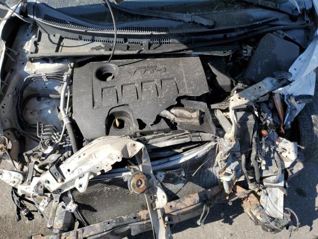 Photo 11 from auction – 2014 TOYOTA COROLLA L with VIN 5YFBURHEXEP013658