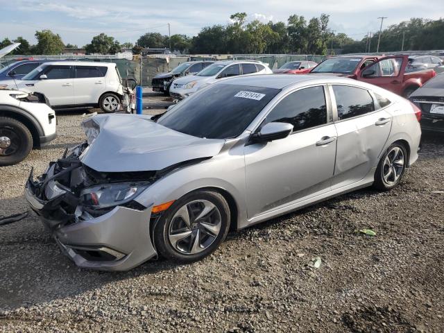 HONDA CIVIC LX 2019 with VIN 2HGFC2E60KH605601 - Photo from auction