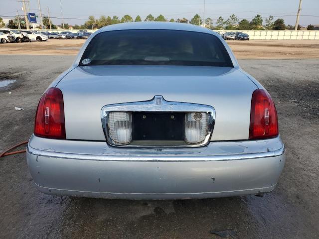 Photo 6 from auction – 2000 LINCOLN TOWN CAR E with VIN 1LNHM81W8YY877899