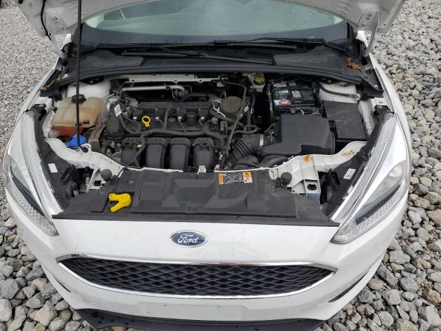 Photo 11 from auction – 2015 FORD FOCUS SE with VIN 1FADP3F25FL373815