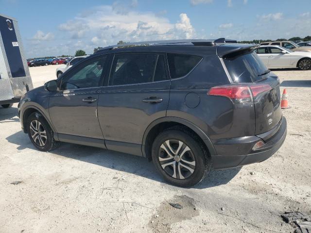 Photo 2 from auction – 2018 TOYOTA RAV4 LE with VIN JTMZFREV2JJ730244