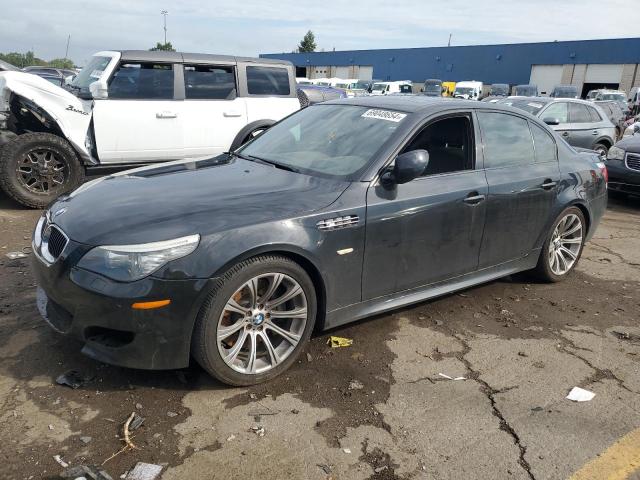 BMW M5 2010 with VIN WBSNB9C5XAC043104 - Photo from auction