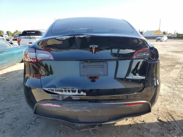Photo 6 from auction – 2023 TESLA MODEL Y with VIN 7SAYGDEE6PF894725