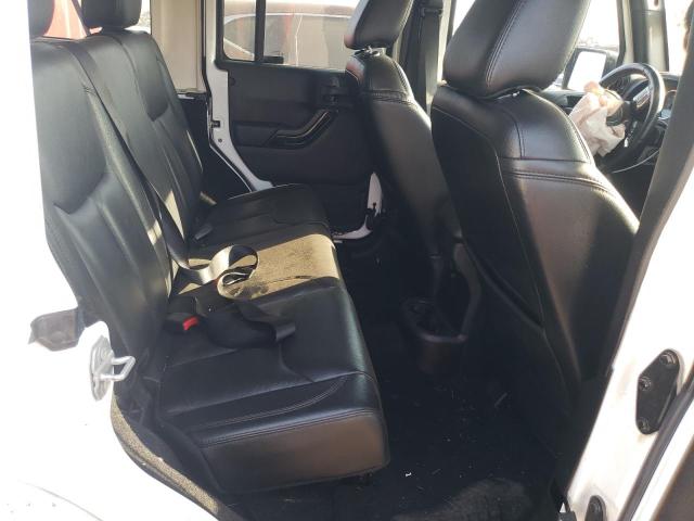 Photo 11 from auction – 2015 JEEP WRANGLER U with VIN 1C4BJWEG8FL744354
