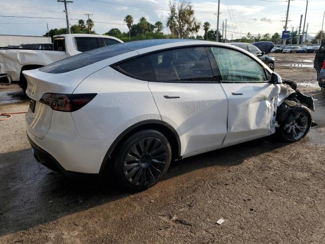 Photo 3 from auction – 2023 TESLA MODEL Y with VIN 7SAYGAEE4PF863973