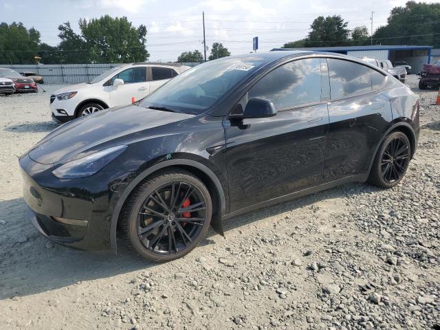 TESLA MODEL Y 2022 with VIN 7SAYGDEF9NF456514 - Photo from auction