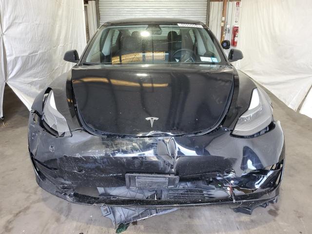Photo 5 from auction – 2022 TESLA MODEL 3 with VIN 5YJ3E1EA6NF372022