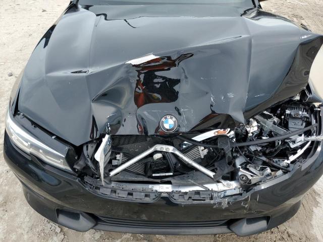 Photo 11 from auction – 2021 BMW 330I with VIN 3MW5R1J02M8B67789