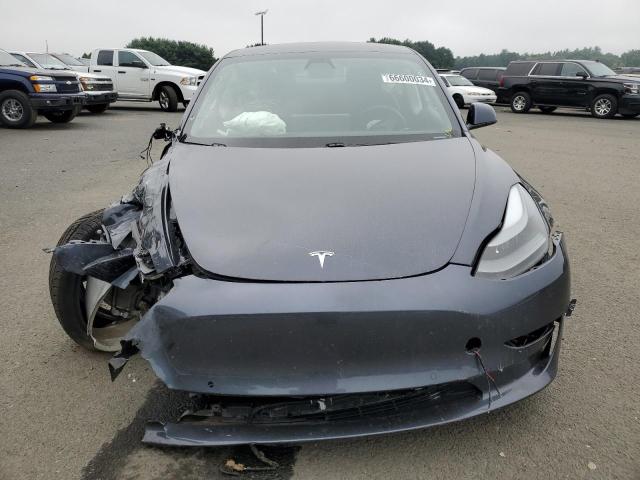 Photo 5 from auction – 2021 TESLA MODEL 3 with VIN 5YJ3E1EB7MF031459