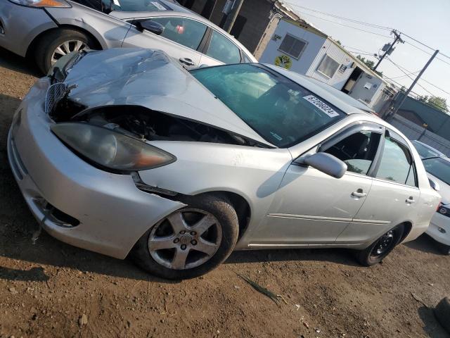 TOYOTA CAMRY LE 2002 with VIN 4T1BF32K42U513671 - Photo from auction
