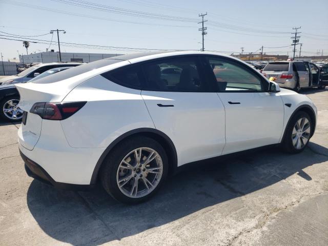 Photo 3 from auction – 2023 TESLA MODEL Y with VIN 7SAYGDEE9PA062390