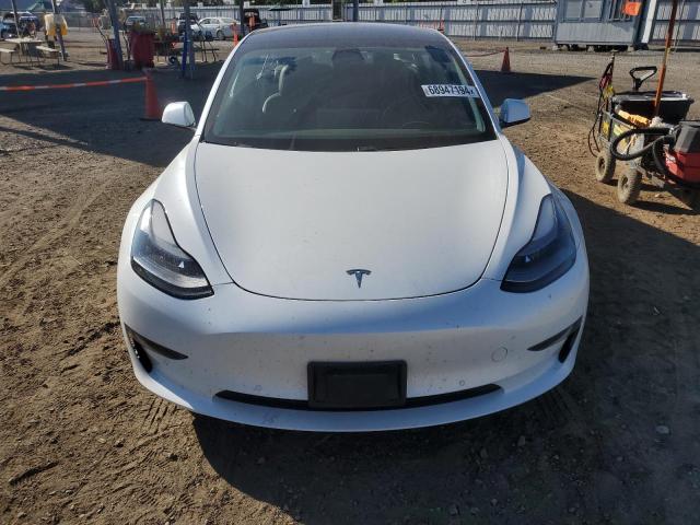 Photo 5 from auction – 2021 TESLA MODEL 3 with VIN 5YJ3E1EA6MF989130