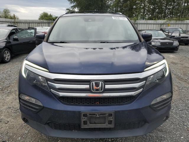 Photo 5 from auction – 2018 HONDA PILOT EXL with VIN 5FNYF6H61JB062832