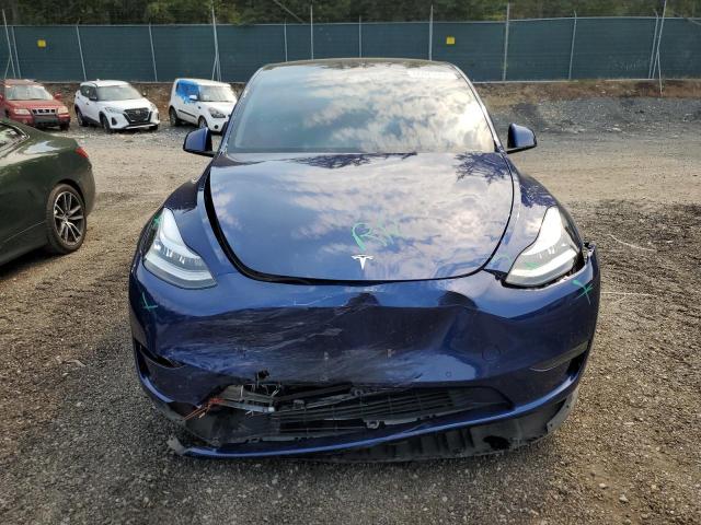 Photo 5 from auction – 2021 TESLA MODEL Y with VIN 5YJYGAEE9MF297558
