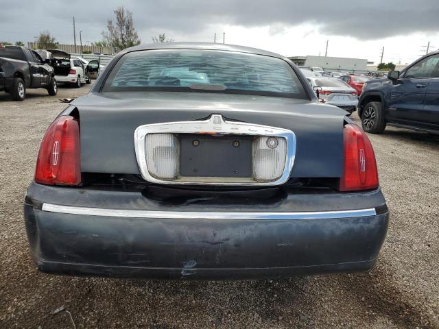 Photo 6 from auction – 2000 LINCOLN TOWN CAR E with VIN 1LNHM81W3YY843997