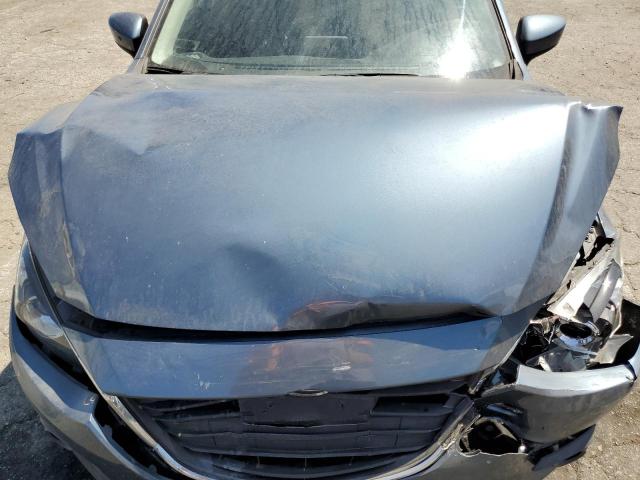 Photo 11 from auction – 2015 MAZDA 3 TOURING with VIN 3MZBM1V78FM229571
