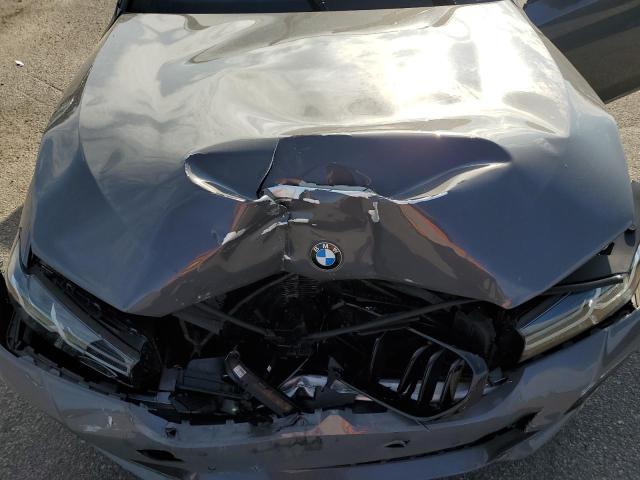 Photo 11 from auction – 2022 BMW M550XI with VIN WBA13BK00NCJ03264