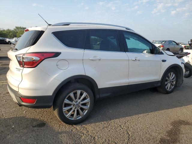 Photo 3 from auction – 2017 FORD ESCAPE TIT with VIN 1FMCU9JD9HUA02112
